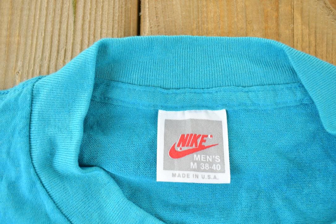 Vintage 1989 Nike Get In Gear Graphic T-Shirt