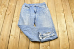 Vintage 1990s LEE Light Washed Distressed Jeans