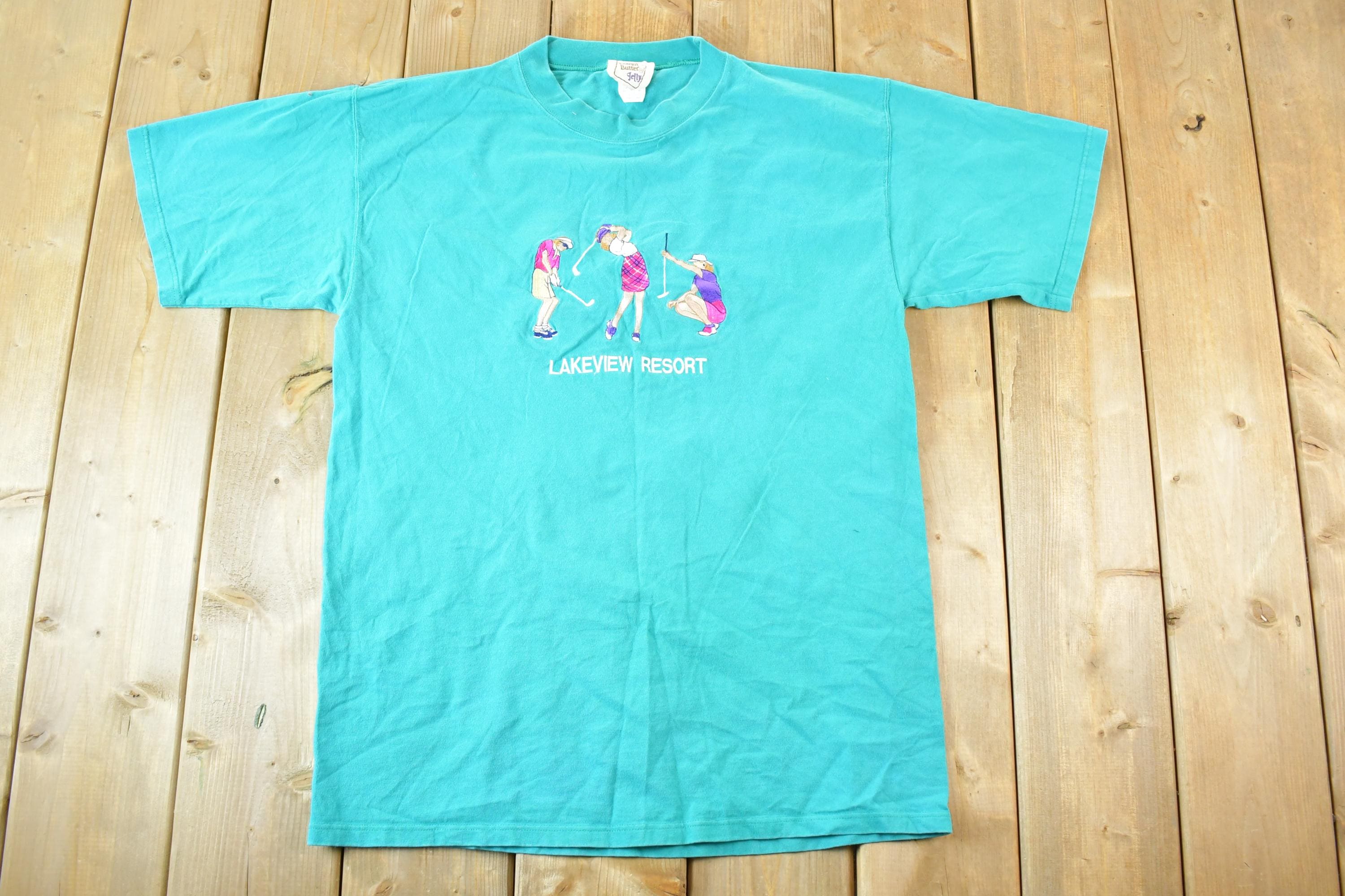Vintage 1990s Lakeview Resort Souvenir Lady Golfing T-Shirt Mens L