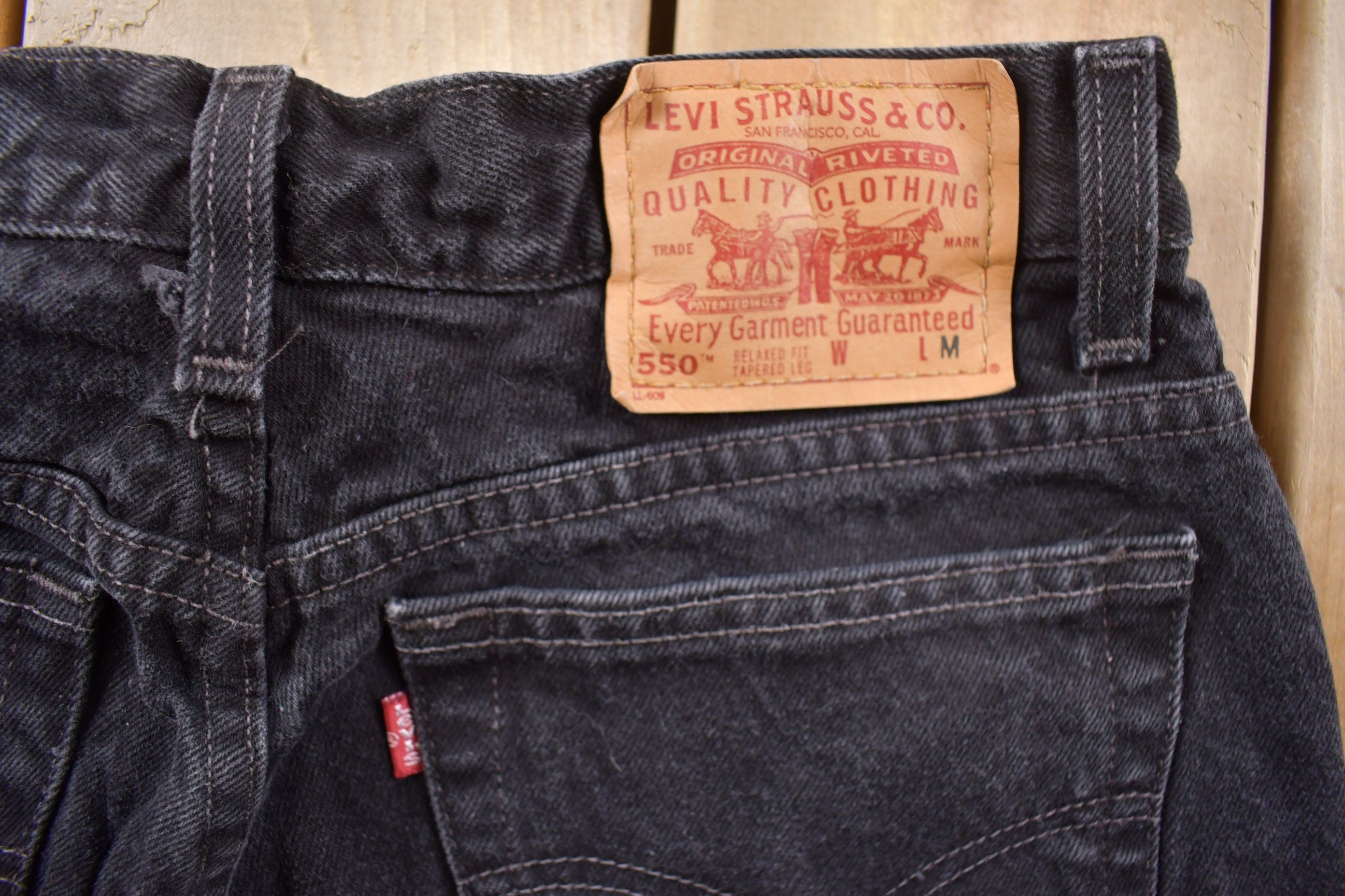 Vintage 1990s Levi's 550 Red Tab Denim Jeans Size 30 x 30