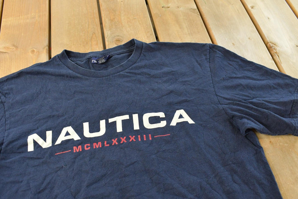 Vintage 1990s Nautica Spellout Graphic T Shirt Men's XL / Big Box Logo Print / 80s / 90s / Streetwear / Preppy / Made In USA