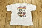 Vintage 1990s Hey Mon Are Jammin Bahamans T-Shirt