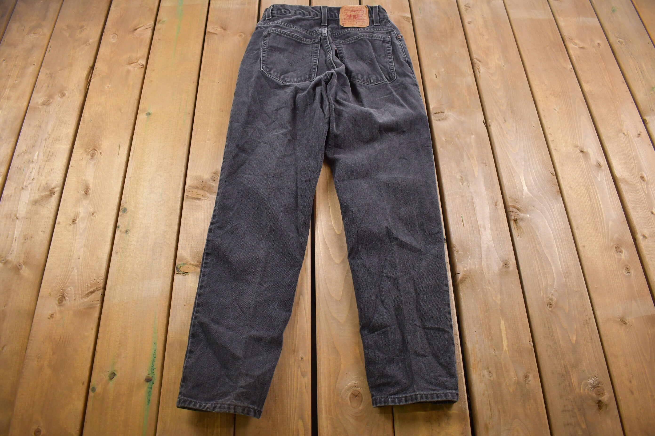 Vintage 1990s Levi's 550 Red Tab Black Denim Jeans Size 25 x 30