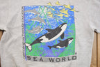 Vintage 1990s Thrashed Sea World Orca Whale Graphic Crewneck Sweatshirt  90s Crewneck  Souvenir  Made In USA  Travel Tourism  Dolphins