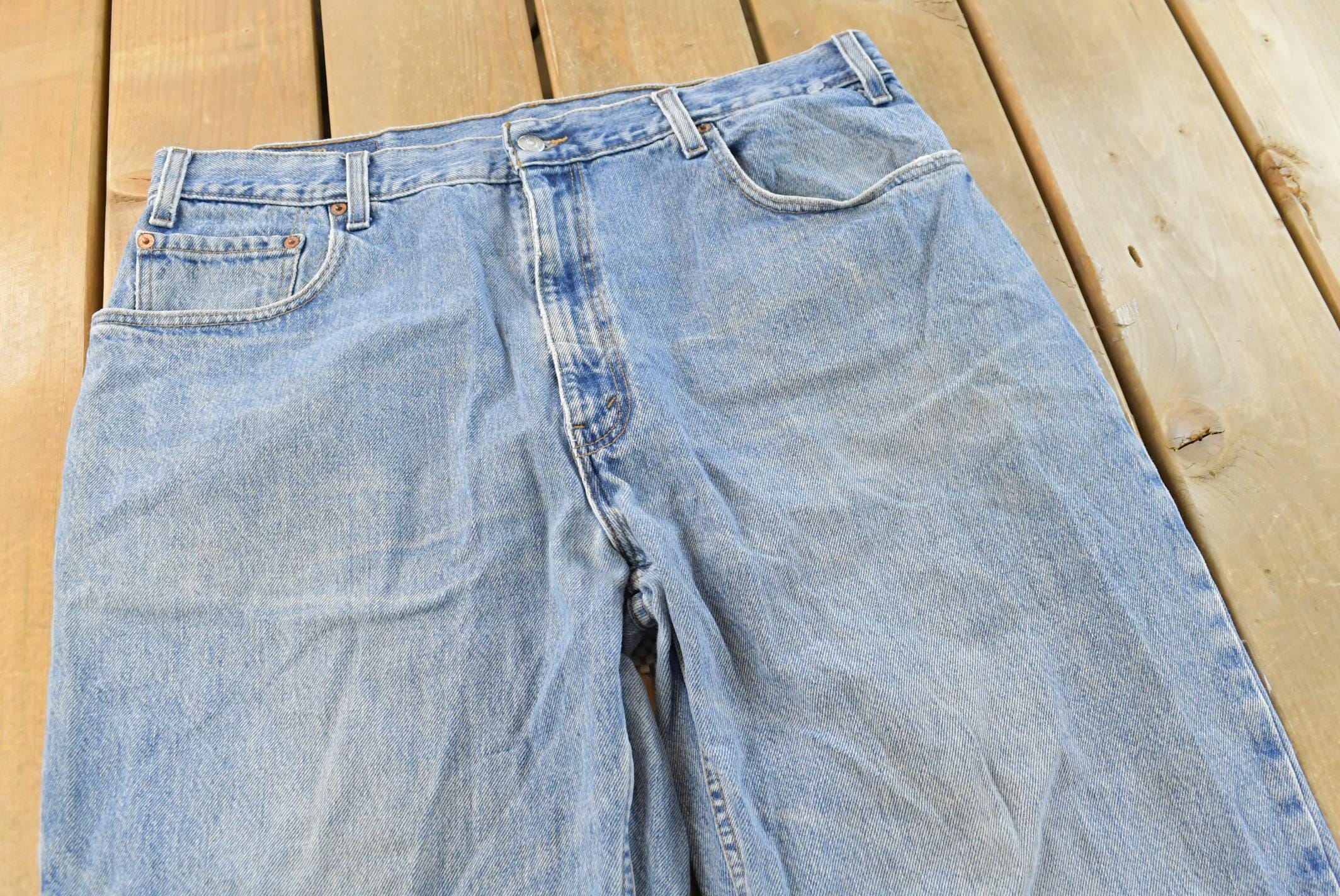 Vintage 1990s Levi's 560 Loose Fit Denim Blue Jeans Size 35 x 30 / 90s Levi's / Distressed Sun Faded Jeans / Streetwear