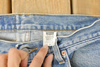 Vintage 1990s Levi's 560 Loose Straight Denim Jeans Women's 32 x 31 / 90s Levi's / Distressed Sun Faded Jeans