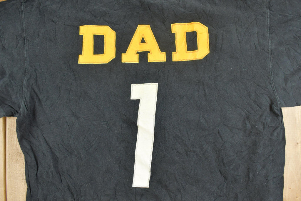 Vintage 1990s Pittsburgh Steelers #1 Dad NFL Graphic T-Shirt