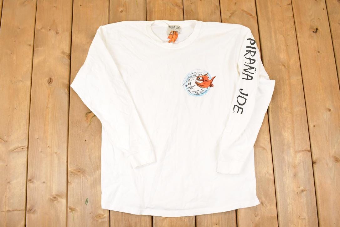 Vintage 1990s Pirana Joe Aruba Sleeve Text Graphic Print Long Sleeve T Shirt Mens L