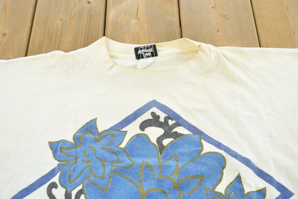 Vintage 1990s Body Wrappers Blue Flower T-Shirt Mens XL