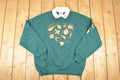 Vintage 1990s Gopher Sport Collared Leaf Design Graphic Print Collared Sweatshirt Women's L