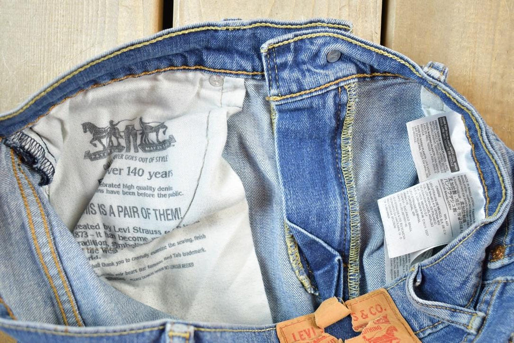 Vintage 1990s Levi Strauss Red Tab 511 Denim Jeans Size 32 x 34