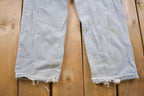 Vintage 1990s Levi's 550 Red Tab Distressed Jeans Size 32 x 27