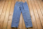 Vintage 1990s Levi's 550 Red Tab Jeans Size 34 x 31