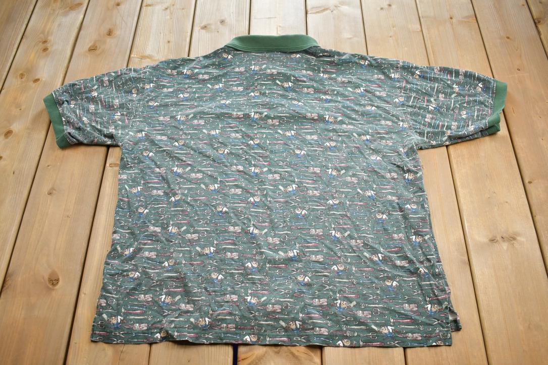 Vintage 1990s Warner Brothers Tasmanian Devil Tools Quarter Button Up Golf Shirt