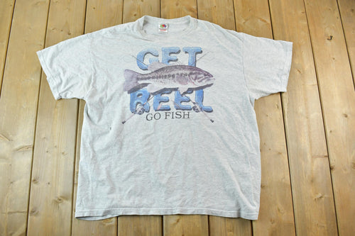 Vintage 1990s Get Reel Fishing Outdoors T-Shirt / Single Stitch Wilderness Shirt / Streetwear / Nature T-Shirt / Outdoorsman T Shirt