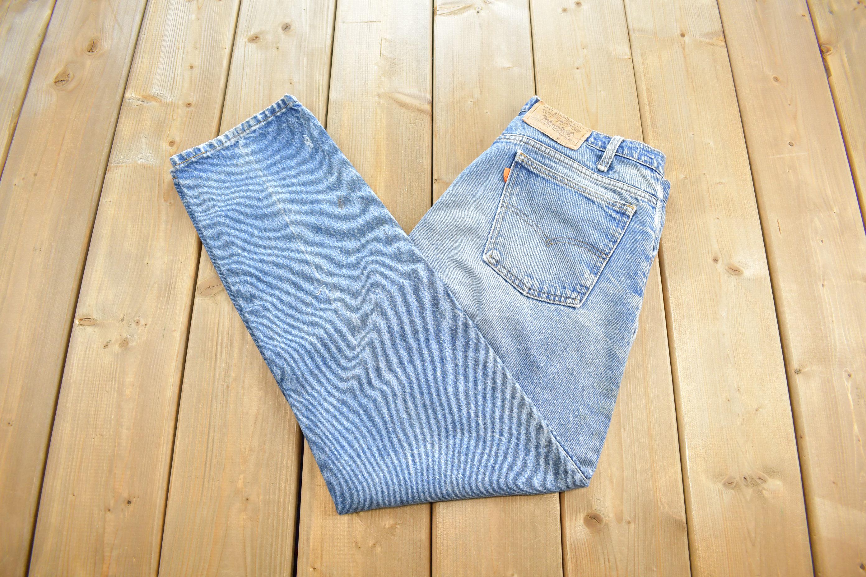 Vintage 1990s Levi's 550 Orange Tab Jeans Size 32x30