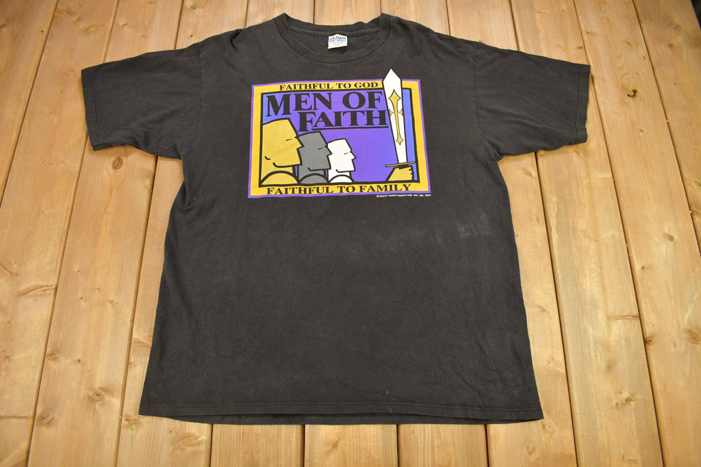 Vintage 1990s Men Of Faith Real Men Love Jesus Graphic T Shirt
