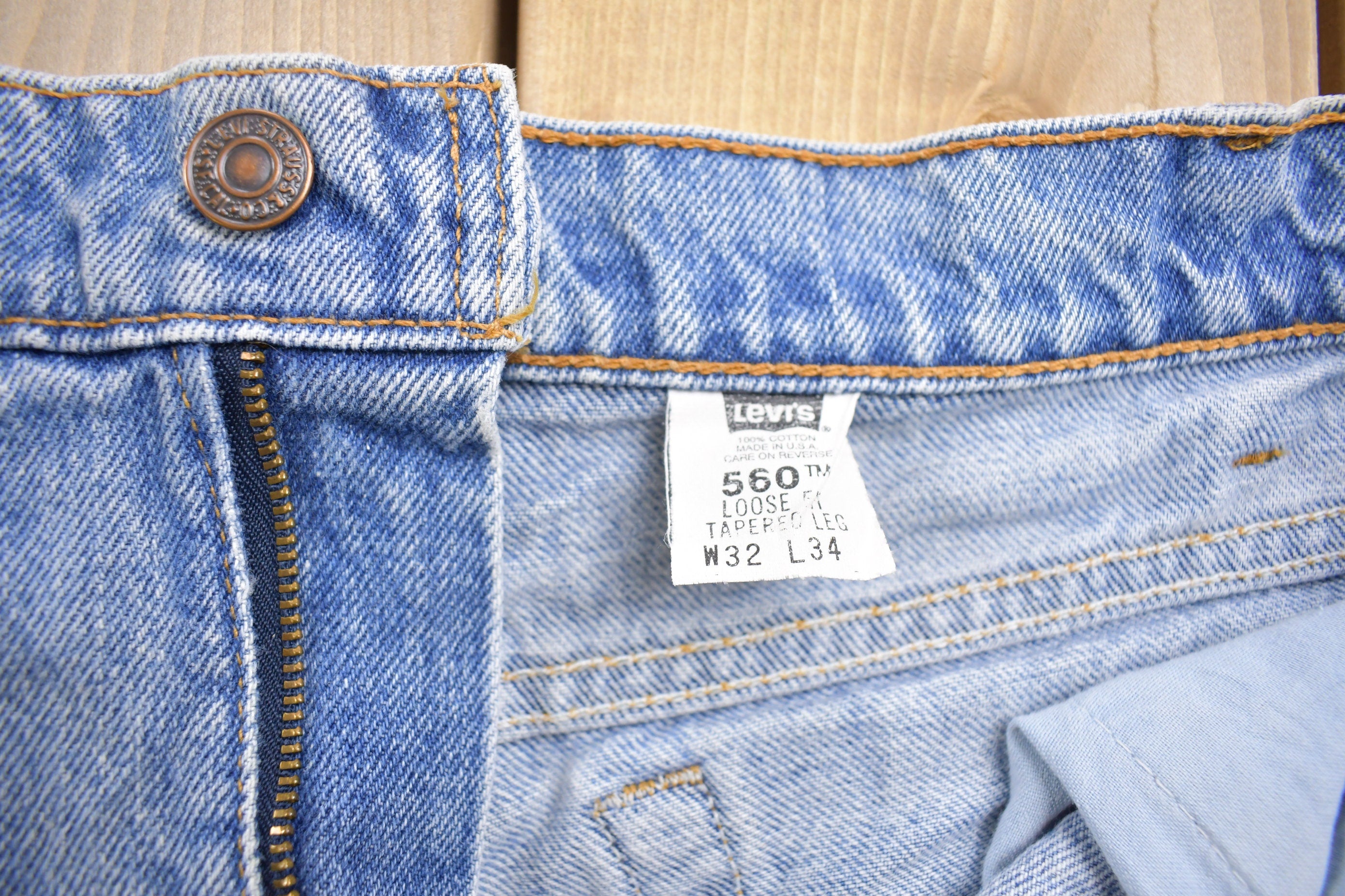 Vintage 1990s Levi's 550 Red Tab Denim Jeans Size 28 x 33