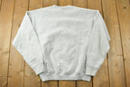 Vintage 1990s Stealth Bomber Knob Noster American Flag Crewneck Sweatshirt