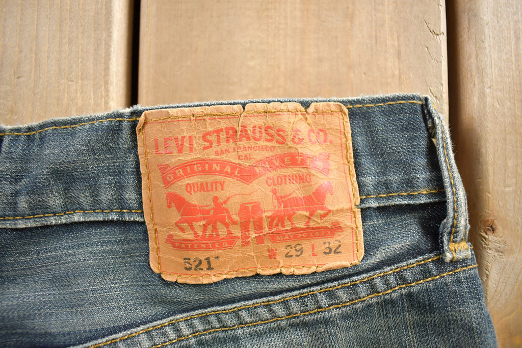 Vintage 1990s Levi's 521 Distressed Jeans Size 29x32