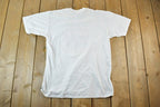 Vintage 1990s Nursing Jerzees Souvenir Single Stitch Graphic Print T-Shirt Made In USA