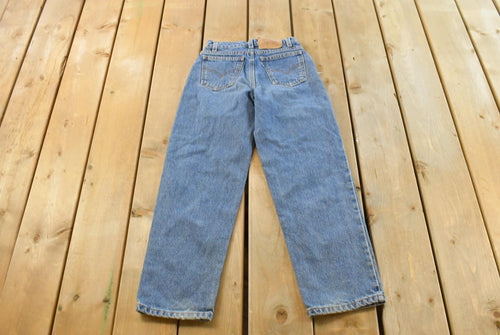 Vintage 1990s Levi's 550 Regular Fit Denim Blue Jeans Size 22 x 24.5 / 90s Levi's / Distressed Sun Faded Jeans / Streetwear