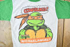 Vintage 1990 Teenage Mutant Ninja Turtles Cowabunga Michaelangelo Graphic Child Size T-Shirt