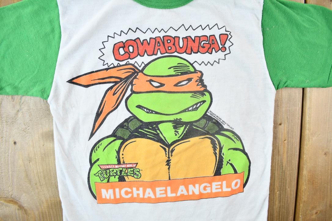 Vintage 1990 Teenage Mutant Ninja Turtles Cowabunga Michaelangelo Graphic Child Size T-Shirt