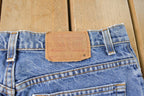 Vintage 1990s Levi's 551 Relaxed Tapered Fit Denim Jeans Women's 33 x 30 / Distressed Jeans / Made in USA