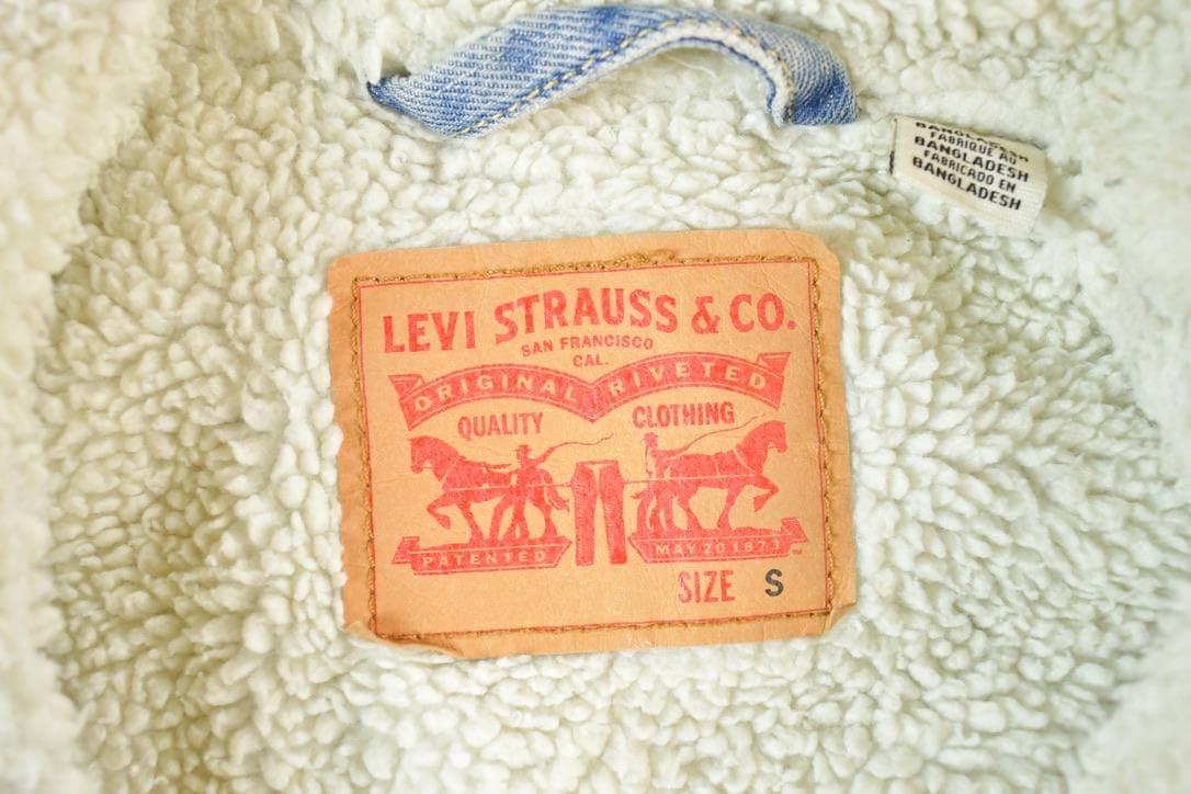 Vintage 1990s Levi's Sherpa Faded Denim Trucker Jean Jacket Red Tab USA Made Jacket