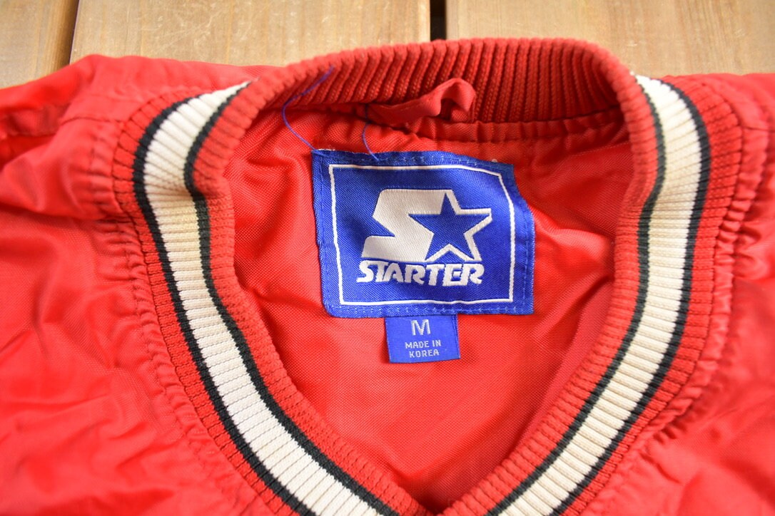 Vintage 1990s University of Nebraska Starter Windbreaker Jacket
