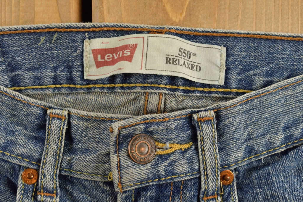 Vintage 1990s Levi's 550 Youth Jeans Size 26 x 26
