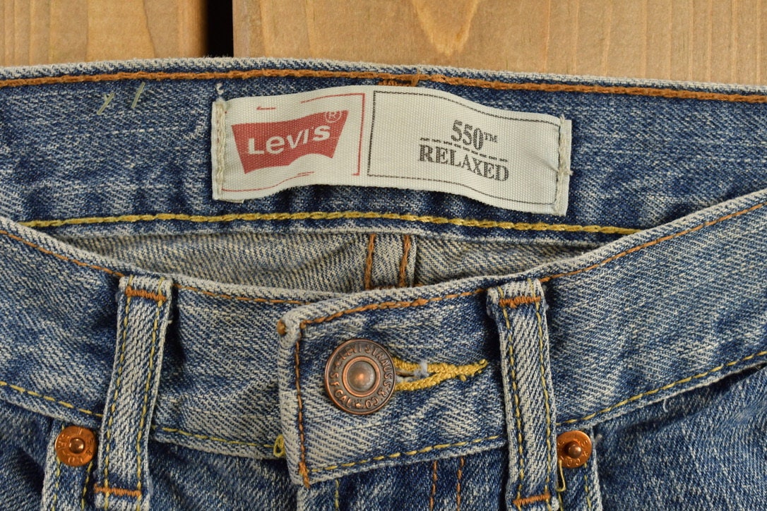 Vintage 1990s Levi's 550 Youth Jeans Size 26 x 26