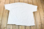 Vintage 1990s Lee Sport Single Stitch Nutmeg Graphic Flower Bouquet T-Shirt