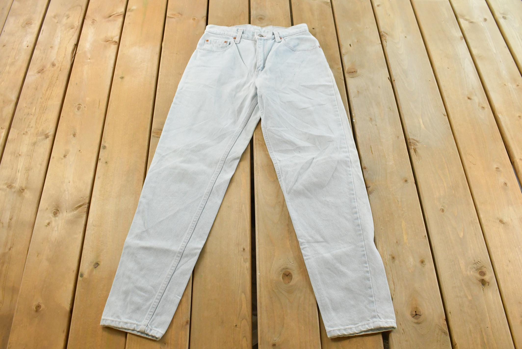 Vintage 1990s Levi's 550 Relaxed Fit Denim Light Wash Blue Jeans Size 26 x 30 / 90s Levi's / Made in USA / Streetwear
