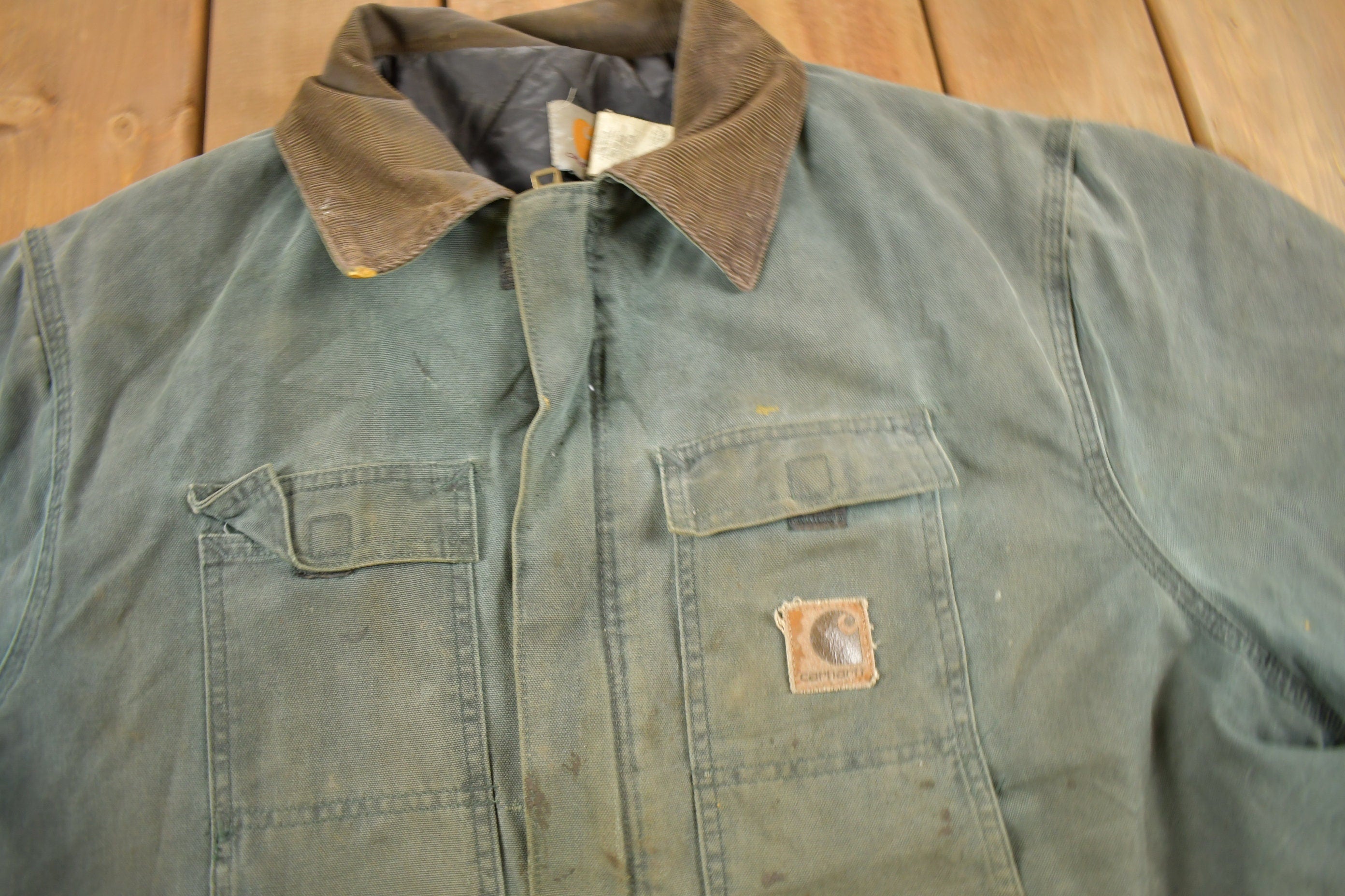 Vintage 1990s Faded Green Quilt Lined Thrashed Carhartt Traditional Jacket Workwear