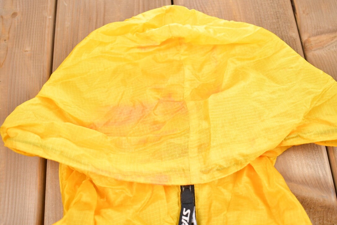 Vintage 1990s Yellow Starter Windbreaker Jacket