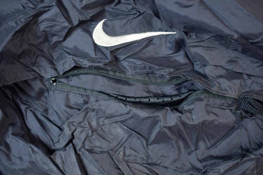 Vintage 1990s Nike Hidden Pocket Windbreaker Jacket