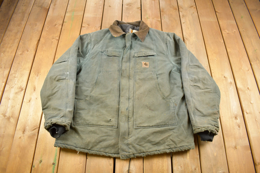 Vintage 1990s Faded Green Quilt Lined Thrashed Carhartt Traditional Jacket Workwear