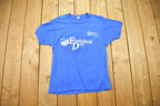 Vintage 1980s Maryland Heights Founder's Day Graphic T Shirt  Single Stitch  Blue  80s  90s  Streetwear Fashion  Made In USA