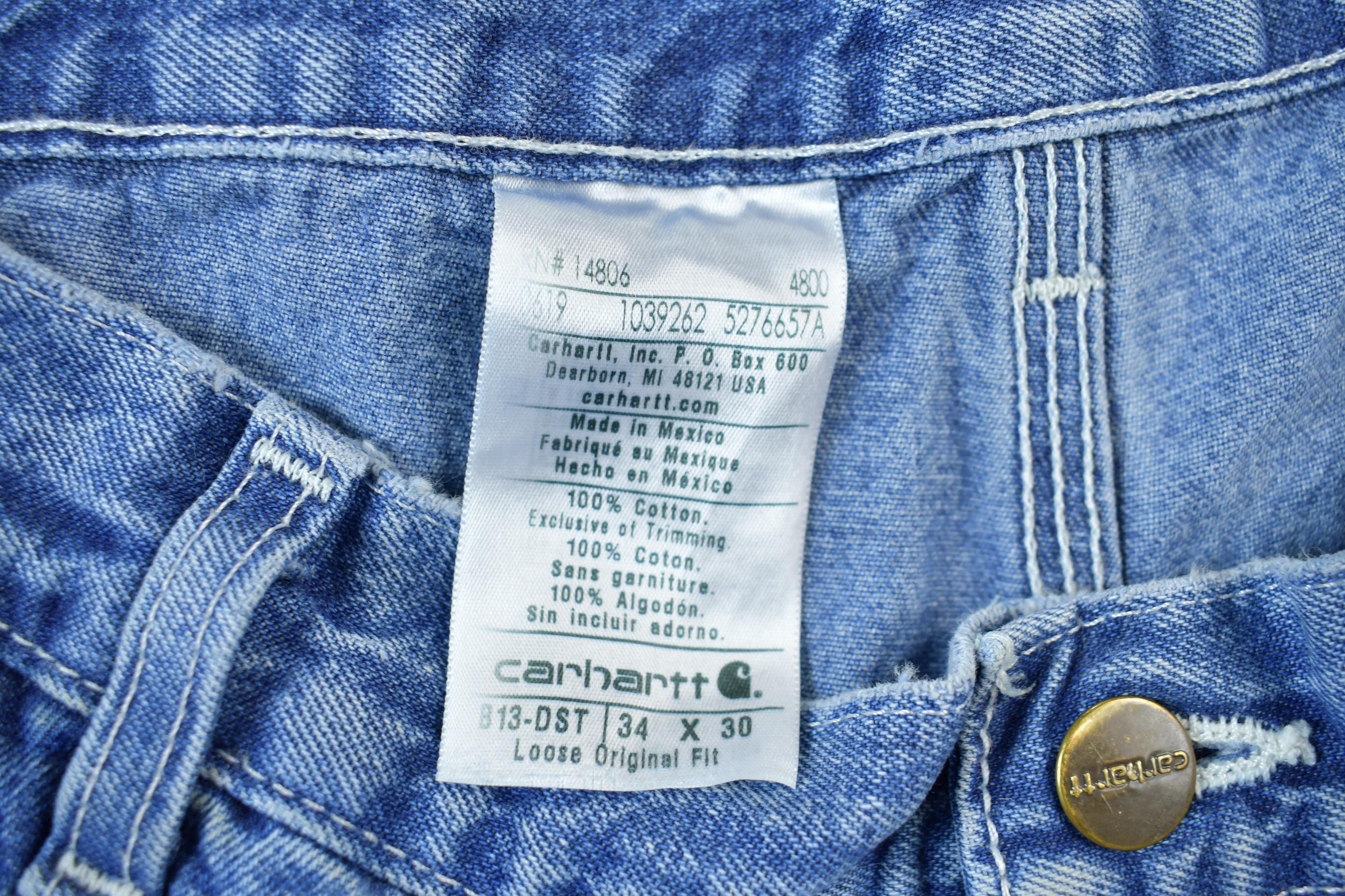 Vintage 1990s Carhartt Work Blue Denim Pants Size 34 x 36