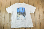 Vintage 1990s Wild Earth Forest Wolves Graphic T-Shirt