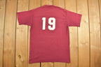 Vintage 1990s Fremont Christian Athletic Graphic T-Shirt Streetwear Single Stitch