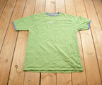 Vintage 1990s Hollywood Jean People Embroidered Graphic T-Shirt Made In USA