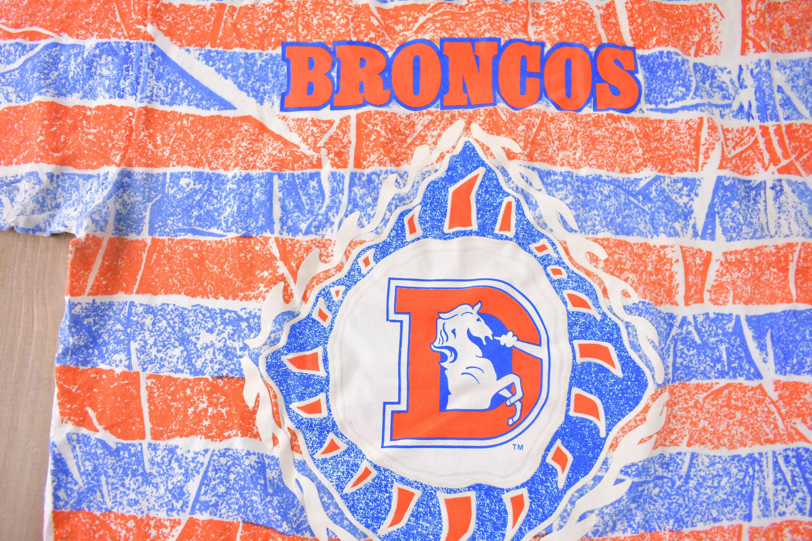 Vintage 1990s Denver Broncos NFL Football All Over Print Graphic T-Shirt Made In USA