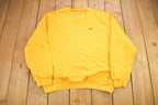 Vintage Y2K Nike Yellow Embroidered Mini Swoosh Crewneck Sweatshirt