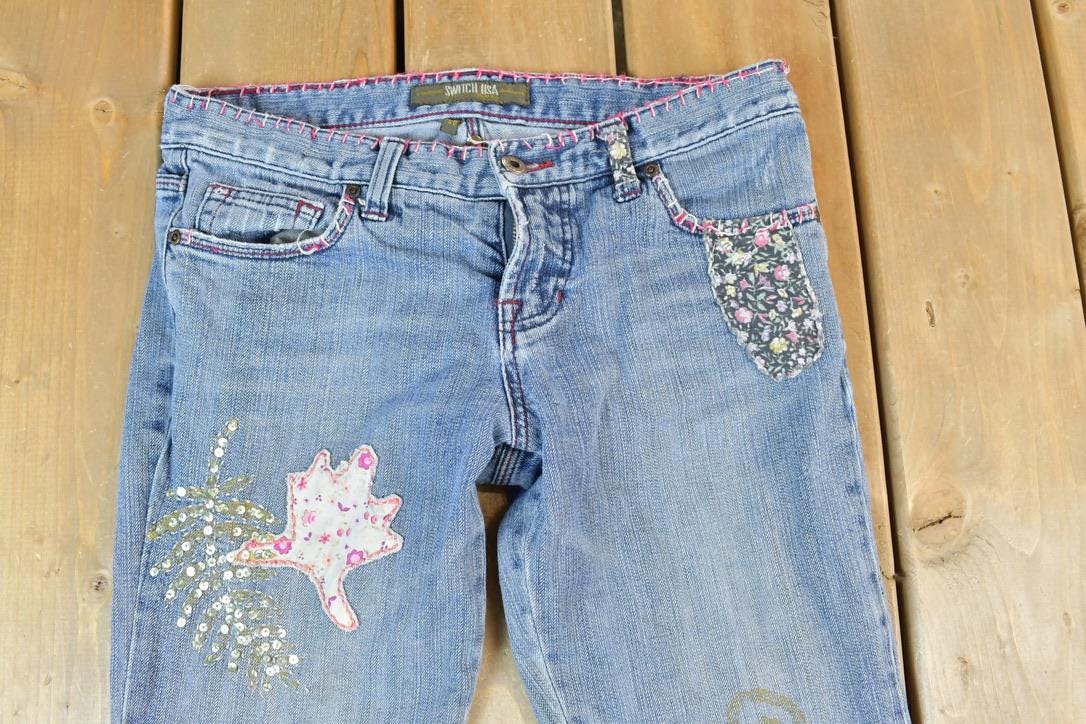 Vintage 1990s Switch USA Patched Denim Bell Bottoms Jeans Size 30 x 32