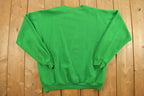 Vintage 1990s Green Cross Christmas Theme Crewneck Sweatshirt