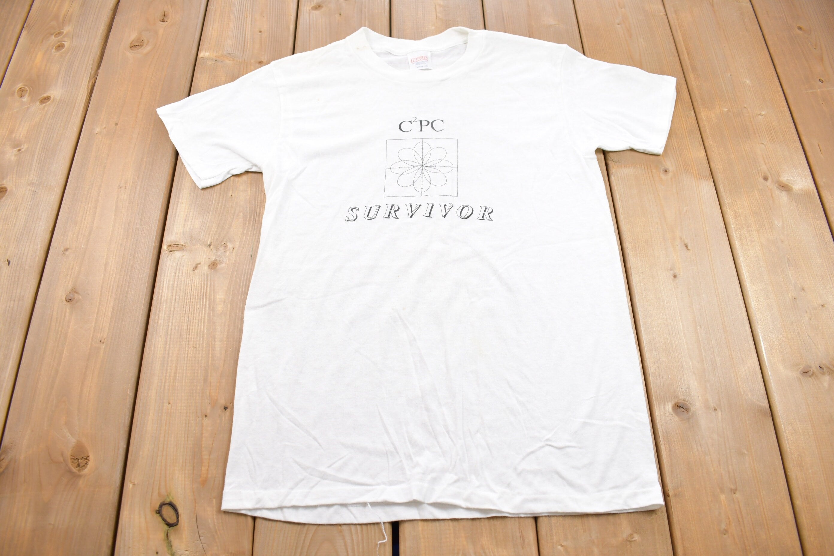 Vintage 1980s CPC Survivor Hugger Graphic T Shirt