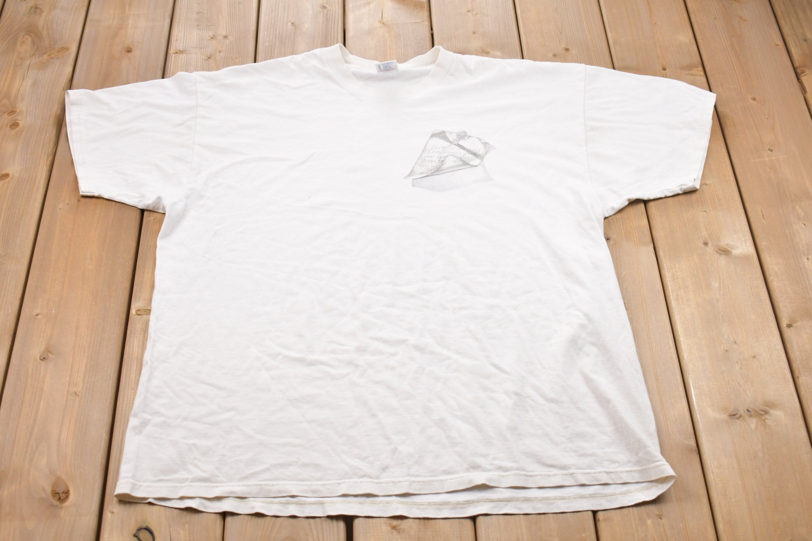 Vintage 1993 Jesus Loves Us Graphic T-Shirt